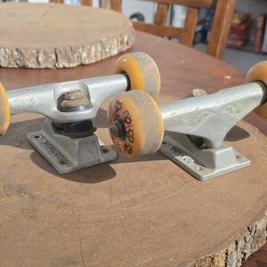 Skateboard Trucks with Orange Wheels